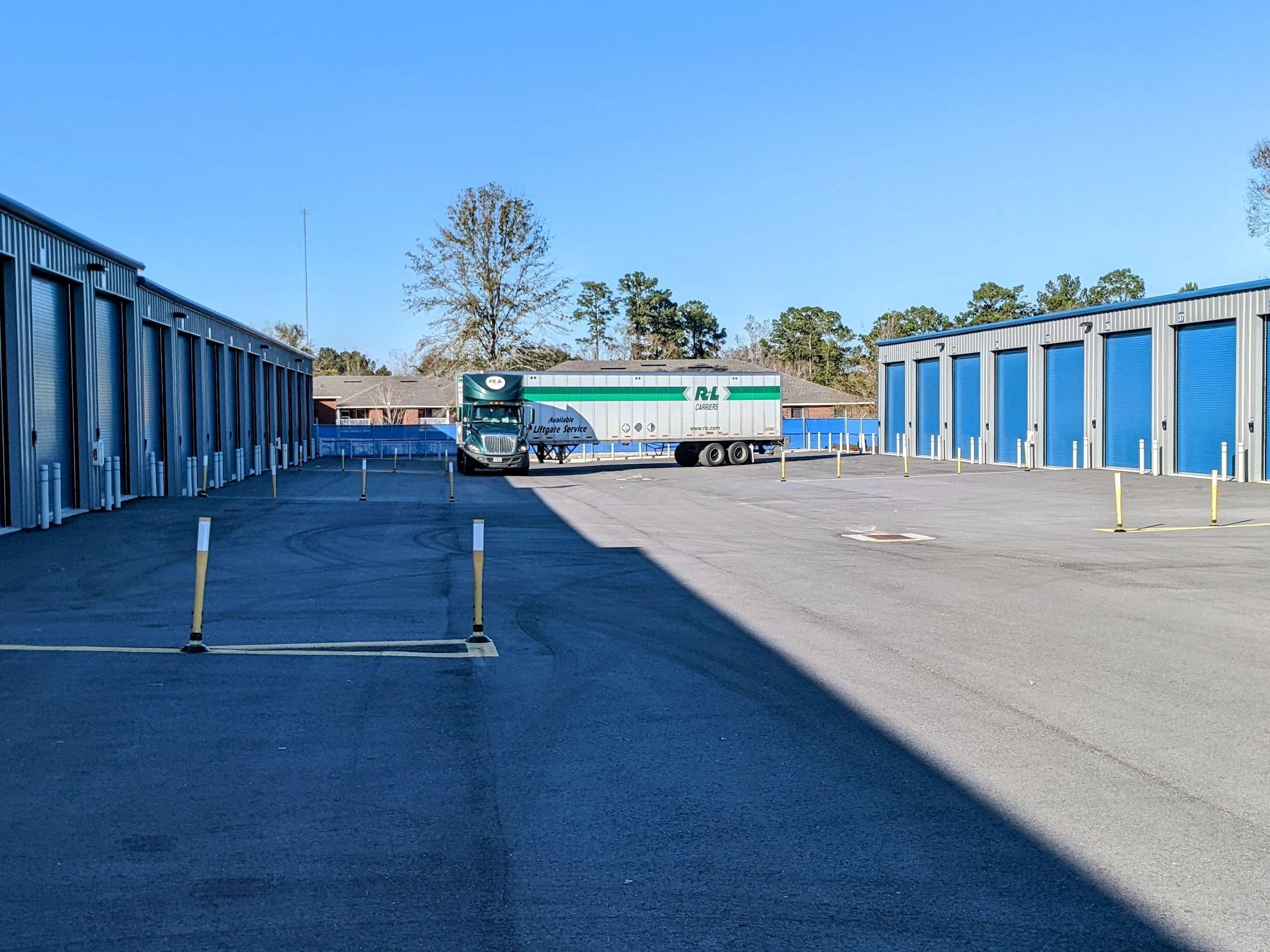 Overview of Spanish Fort Climate-Controlled Oversized Storage Facility showing wide driveway and large units