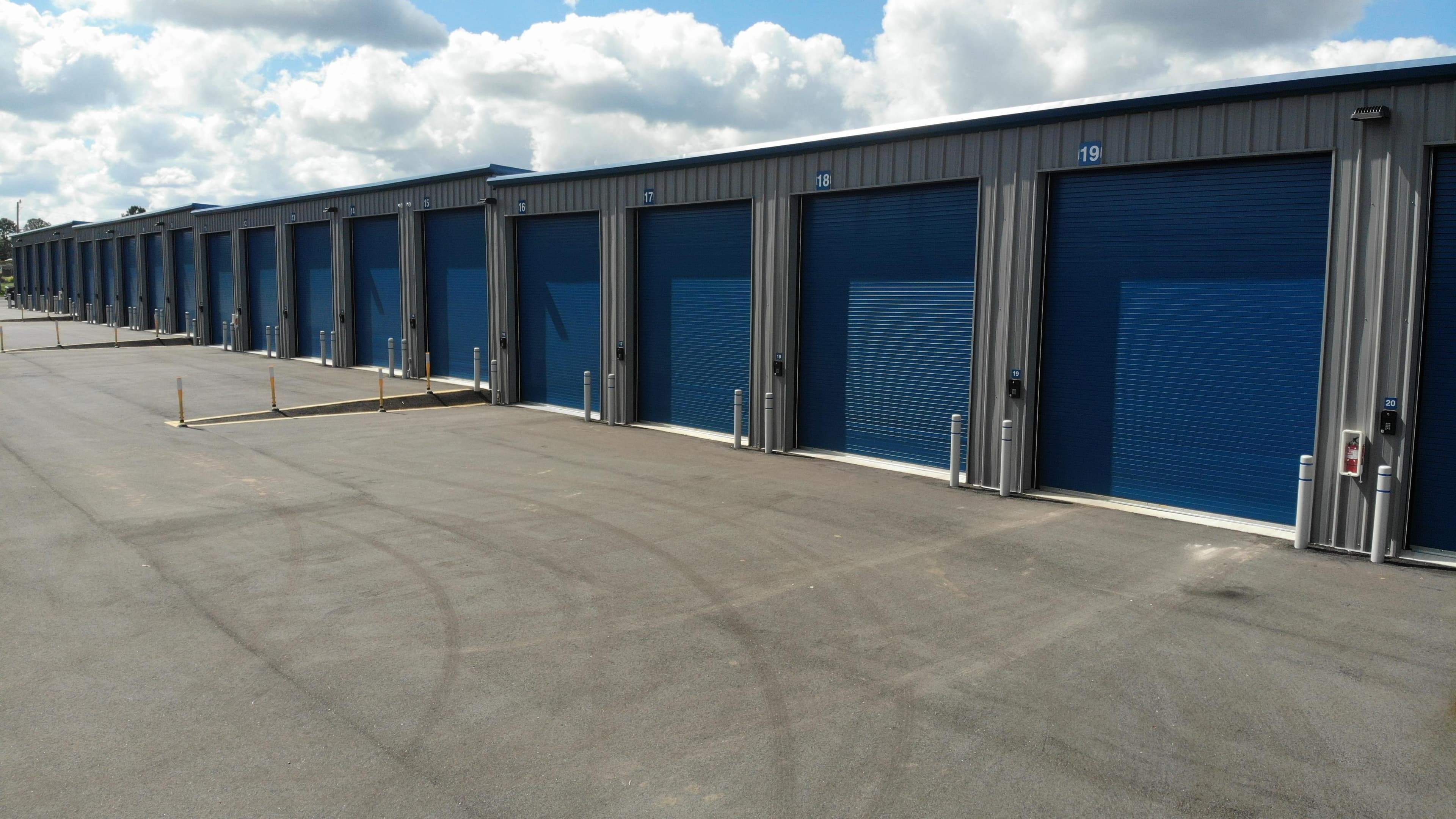 Overview of Spanish Fort Climate-Controlled Oversized Storage Facility showing wide driveway and large units